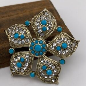 Monet Gold Tone Faux Turquoise Flower Brooch